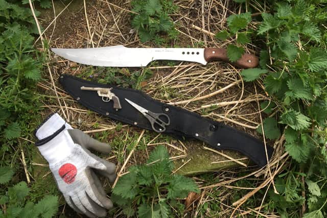 The blade was estimated to be 18 inches long and was found inside a sheath.