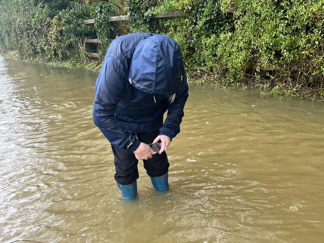 Flooding in Yardley Hastings where villagers can't go through High Street.