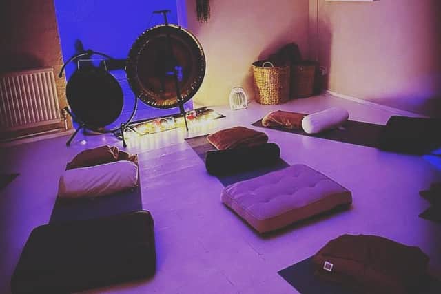The business offers yoga, reflexology, meditation circles, sound baths and classes for older individuals to keep them strong and balanced, among much more.