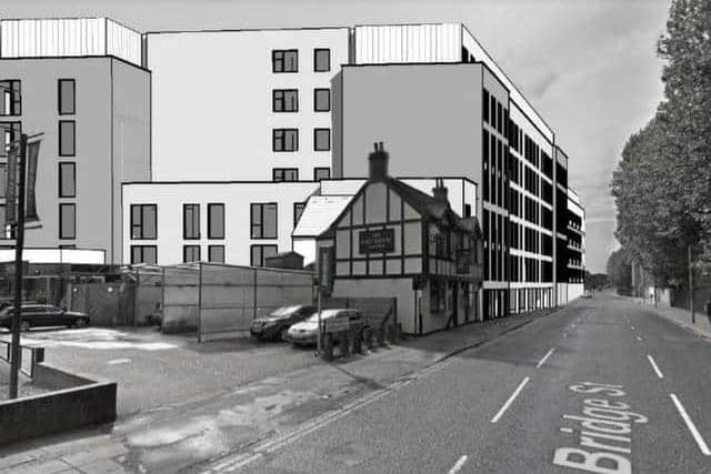 An artist's impression of what the flats could look like next to the Malt Shovel pub