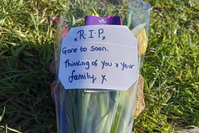 A single floral tribute was laid for the 19-year-old victim on Tuesday morning (April 25)