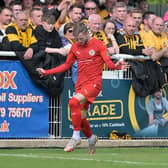 Morgan Roberts celebrates after firing Brackley Town into the lead against Boston United (Picture: Pete Keen)