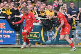 Morgan Roberts celebrates after firing Brackley Town into the lead against Boston United (Picture: Pete Keen)