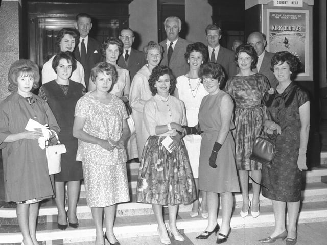 Looking Back old glass negs June 23, 1962 Mother and baby prizes presentation at cinema showing a Kirk Douglas film