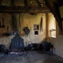 Witch post and fire place, in 'Stang End' longhouse, Ryedale Folk Museum-