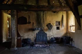 Witch post and fire place, in 'Stang End' longhouse, Ryedale Folk Museum-