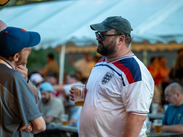 Fans watching England’s 0-0 draw with Ghana in the garden of The Black Prince in Northampton on Tuesday, June 23, 2026. Photo by David Jackson.