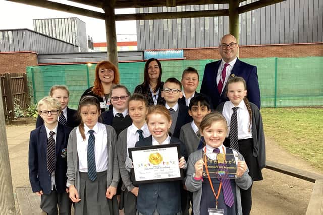 primary school kids with teachers