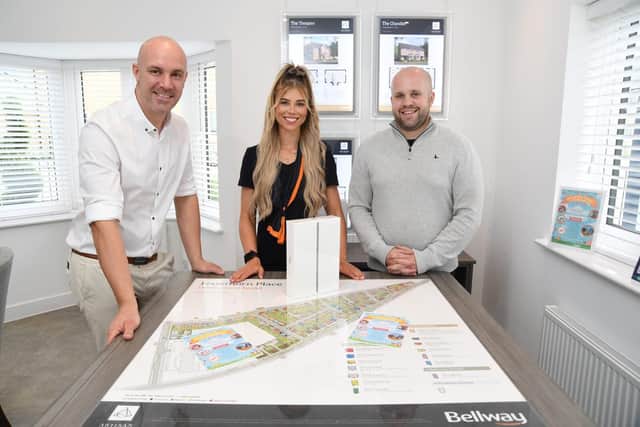 Arron Fellows, Lily Remington and Dominic Aloia with donated iPad at Hawthorn Place, Wellingborough