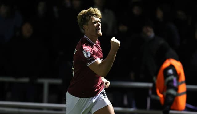 Cameron McGeehan shows his delight after scoring his second - and decisive - goal during Monday's derby.
