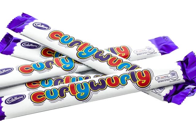 Cadbury is cutting the calories of their popular Chomp, Curly Wurly and Fudge chocolate bars, in an attempt to tackle childhood obesity (Photo: Shutterstock)