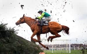 Power category – j ockey Nico de Boinville riding Topofthegame clears the last fence in the Betway Mildmay Novices’ Chase during Ladies Day at Aintree Racecourse on April 5 2019 in Liverpool– Photo by Alex Livesey/Getty Images)