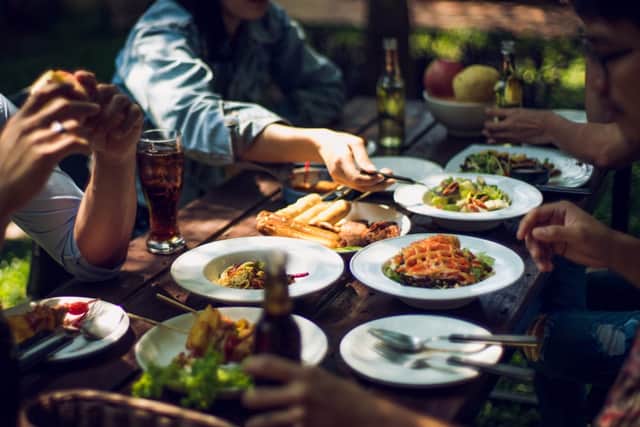 Bills at restaurants and pubs will be cut half when customers eat out, as part of a new government scheme (Photo: Shutterstock)
