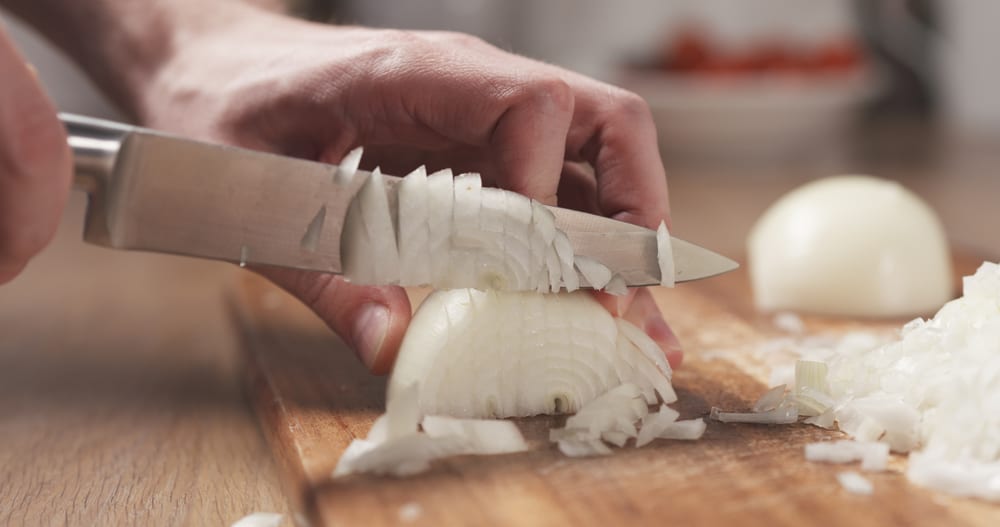 This life hack for chopping onions without crying is being called 'game ...