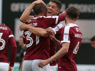 Alex Revell is relishing Wednesday night's clash with Manchester United