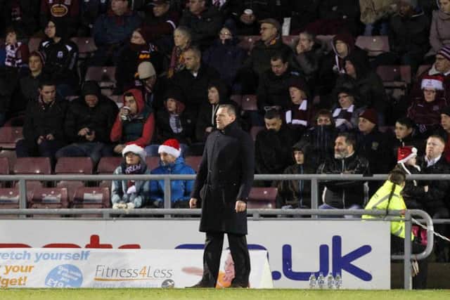Aidy Boothroyd pictured during his final match in charge of the Cobblers, a 4-1 defeat to Wycombe Wanderers at Sixfields in December, 2013