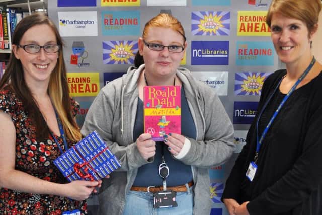 Hannah Painting, left, and Amy Harnaman, right, with Sarah Lawless