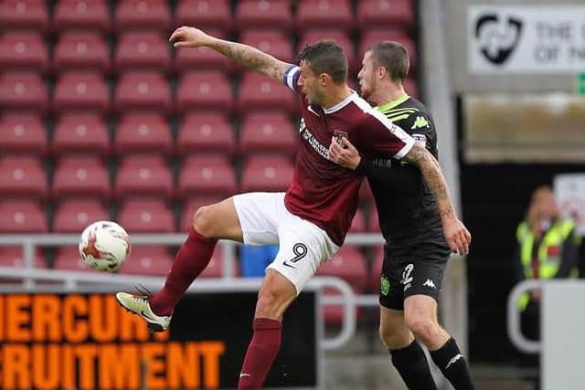 Marc Richards shields the ball