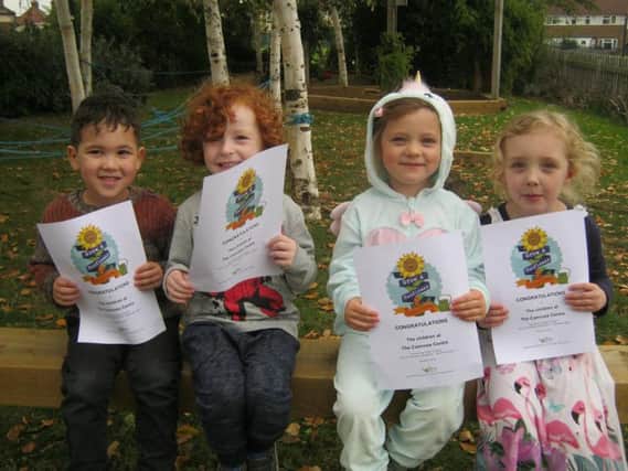 Three-year-old Noah Wolfenden, four-year-old Albie Osborne, four-year-old Elfin Hancock and three-year-old Tabitha Humphries from The Camrose Early Years Centre with their certificates