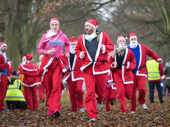Abington Parkplayed host to 2500 of Father Christmas in aid ofNorthampton charity event, whichtook place over the weekend.