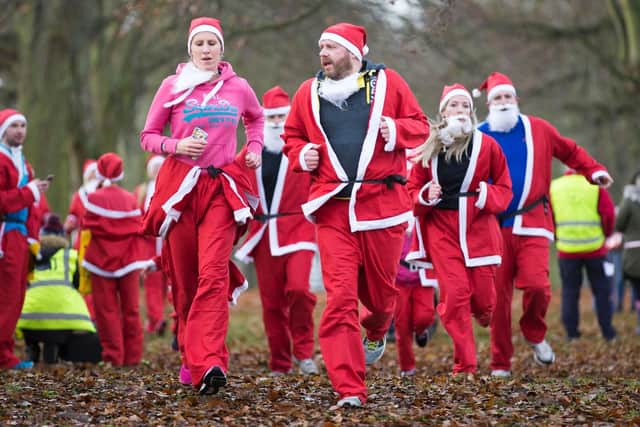 Abington Parkplayed host to 2500 of Father Christmas in aid ofNorthampton charity event, whichtook place over the weekend.