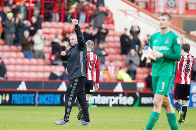 Thumbs up: Chris Wilder acknowledges the away fans at Bramall Lane