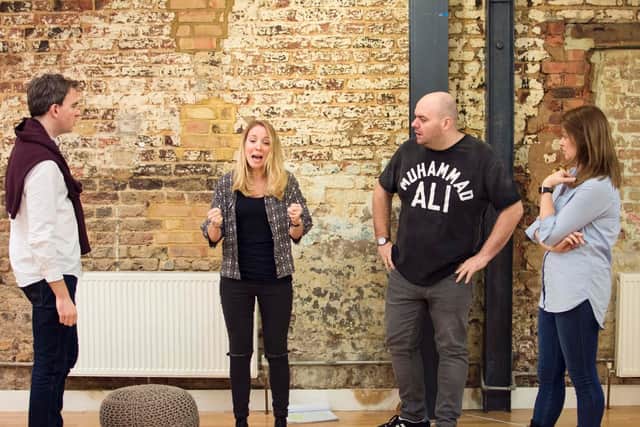 Cast of Invincible in rehearsals.