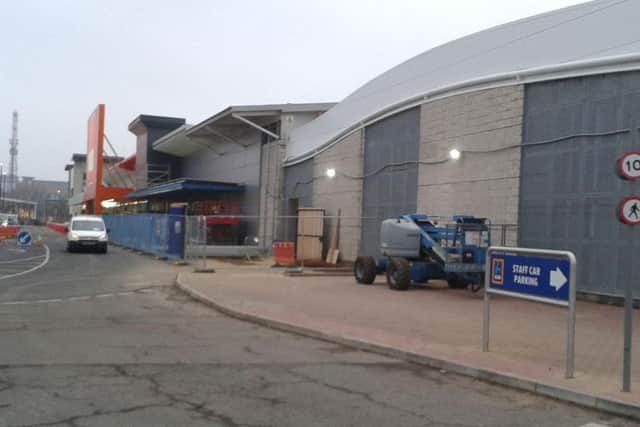 Work gets under way at the site, which is currently wholly occupied by B&Q