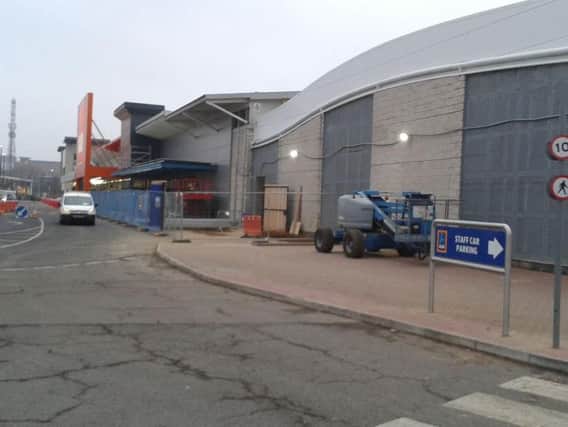 Work gets under way at the site, which is currently wholly occupied by B&Q