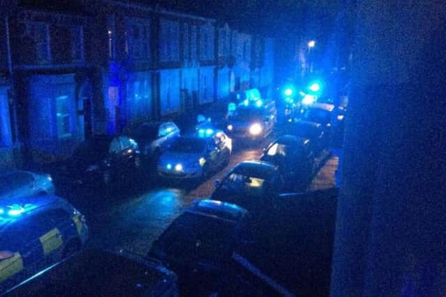 13 police cars lined the street to deal with the party.