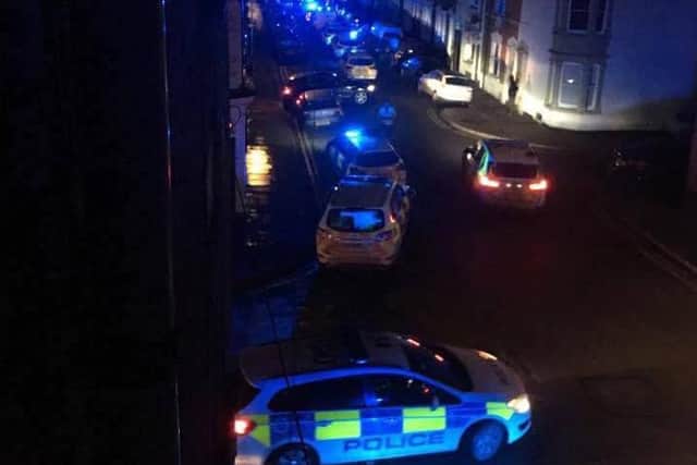"They spilt out of the house like ants. There must have been 40 people," said one neighbour.
