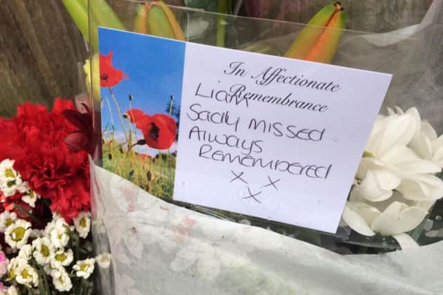 A message left by a mourner at the alleyway where Liam was killed.