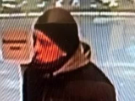Police have released this CCTV image of a man they want to talk to