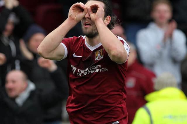 John-Joe O'Toole celebrates scoring the winning goal for the Cobblers against Charlton on Saturday (Pictures: Sharon Lucey)