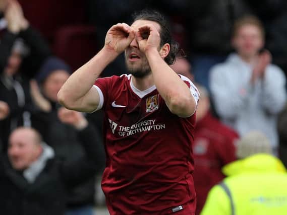 John-Joe O'Toole celebrates scoring the winning goal for the Cobblers against Charlton on Saturday (Pictures: Sharon Lucey)
