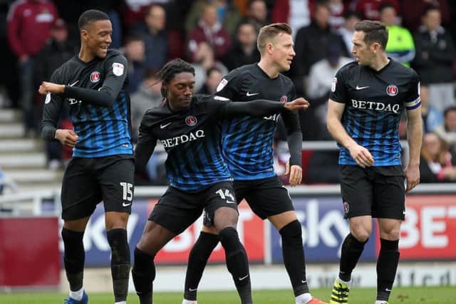 Charlton celebrate their goal at Sixfields