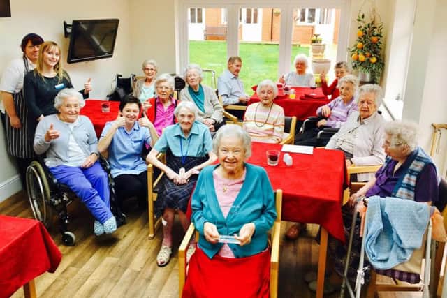 The residents of Grangefield Care Home with the newly-minted award.