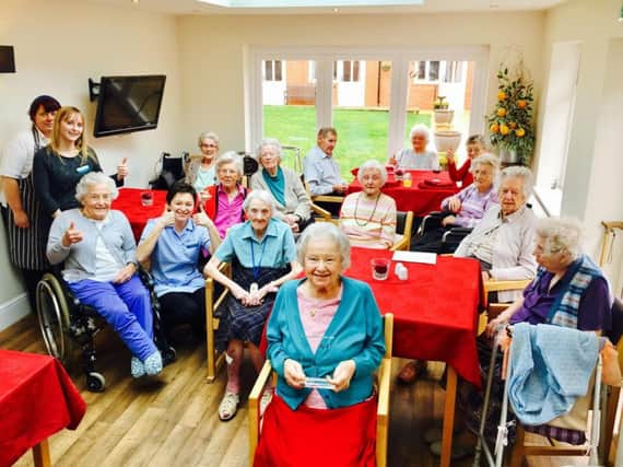 The residents of Grangefield Care Home with the newly-minted award.