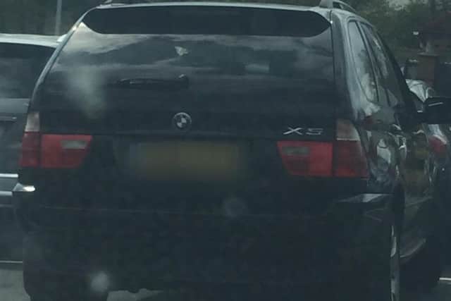 The BMW was 'parked' in lane three of the M1.