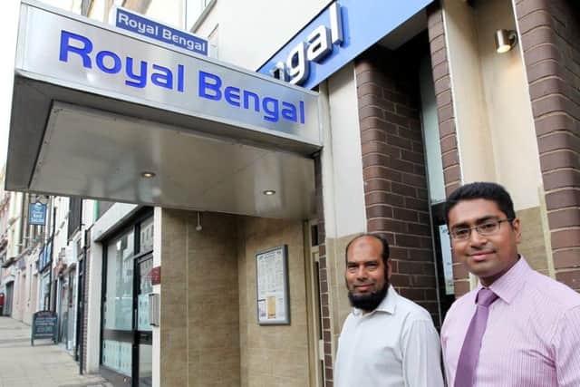 Abdul and Mohammed Ahmin outside the Royal Bengal, which they say is closing due to a rise in business rates and on-going issues in Bridge Street
