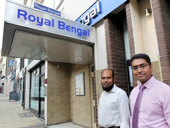 Abdul and Mohammed Ahmin outside the Royal Bengal, which they say is closing due to a rise in business rates and on-going issues in Bridge Street
