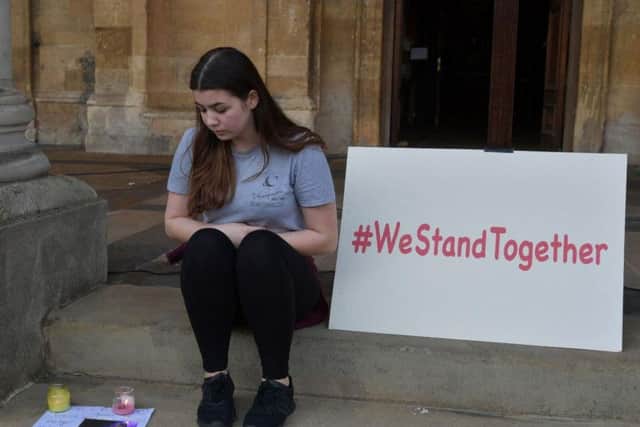 A vigil was held on the steps of Northampton's All Saints Church yesterday evening.