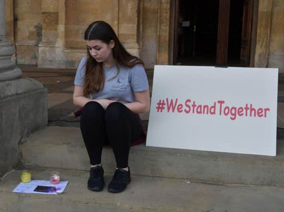 A vigil was held on the steps of Northampton's All Saints Church yesterday evening.