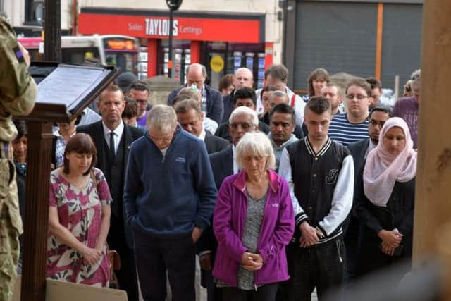 Prayers and tributes were read out on the steps of the church.