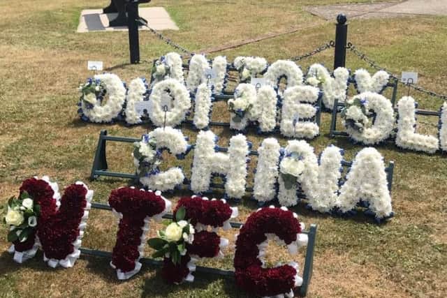 White and claret flowers were sent to Millwall from the Cobblers.
