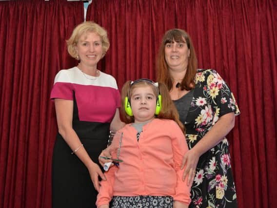 Sue Knox, from Wellingborough School, presents the Inspirational teacher award to Nicole Lawson, from Rowan Gate Primary School.