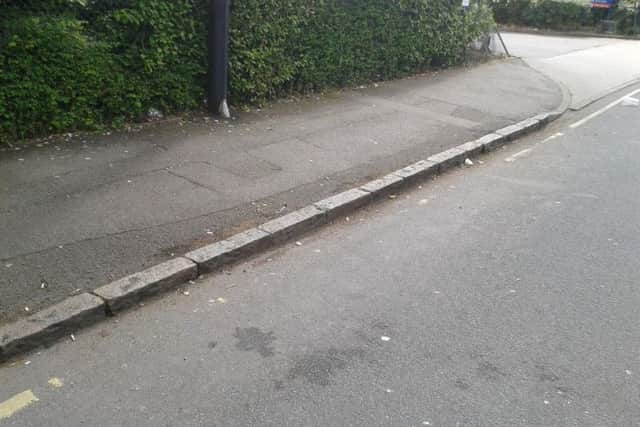 The spot Paul parked on in May. Would you say the yellow line here is clear?