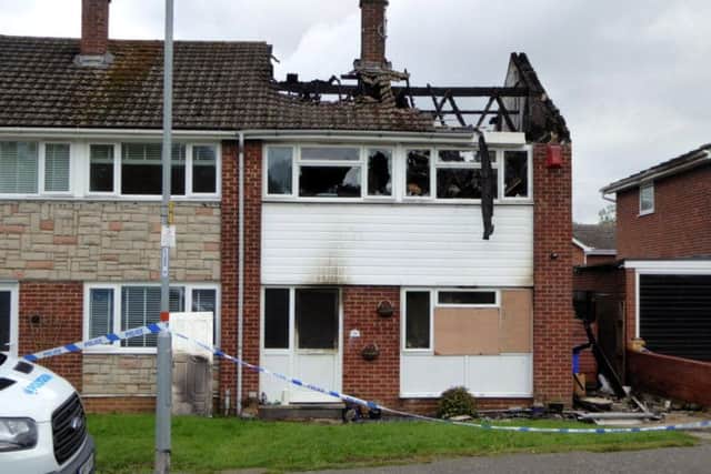 The semi-detached property was taped off by police.