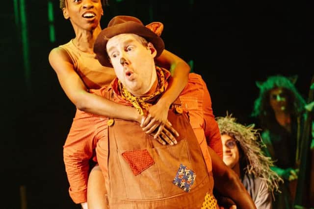 Kezia Joseph as Mowgli and Dyfrig Morris as Baloo. Picture by Manuel Harlan