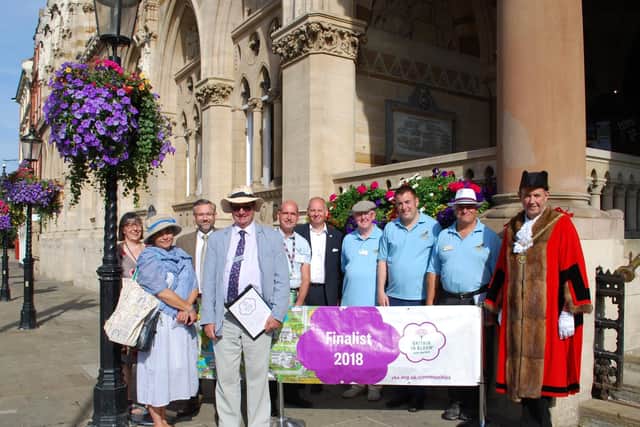 Britain in Bloom judges have toured Northampton as part of the town's bid to win one of the categories in the national competition.